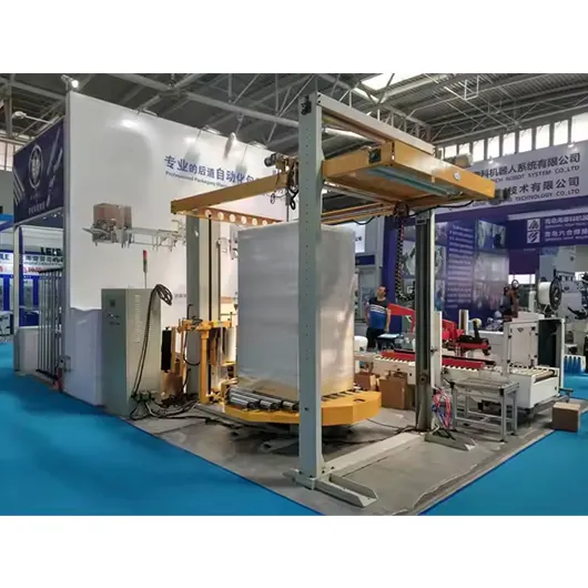 Máquina envolvedora automática de palets con cinta transportadora y dispensador de hojas superiores
